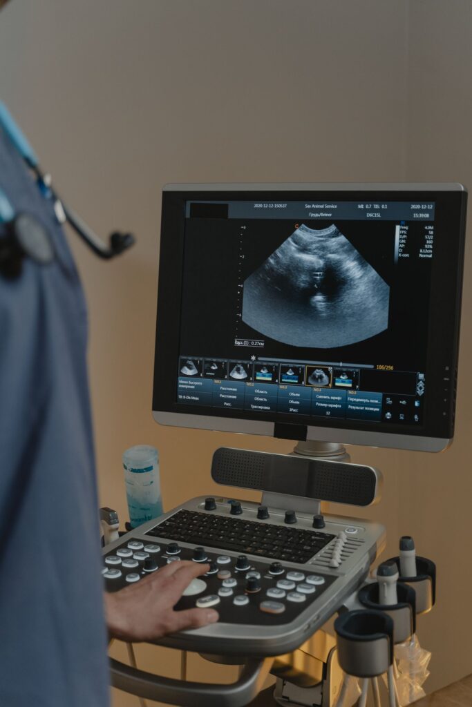 Medical practitioner operating an ultrasound machine imported into Ethiopia